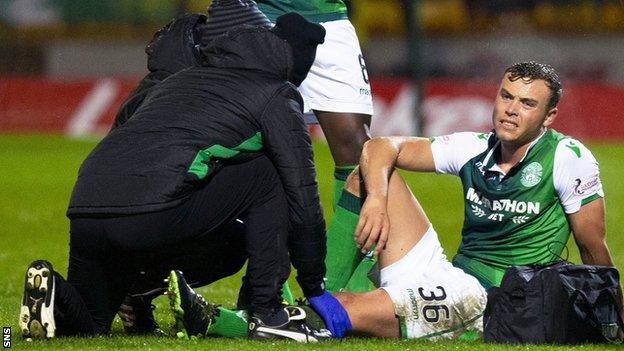 Hibernian defender Ryan Porteous receives treatment