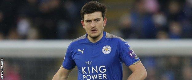 Leicester City defender Harry Maguire looks up as he carries the ball forward against Swansea City in the Premier League