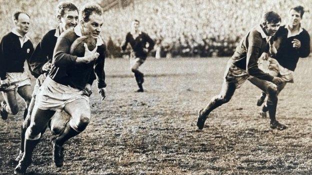 Ken Jones in action against Scotland in one of his 14 Wales caps