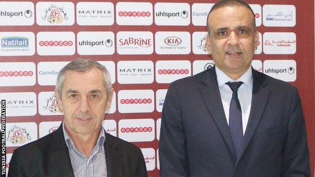 French coach Alain Giresse (left) alongside Tunisia Football Federation president Wadia Jaria