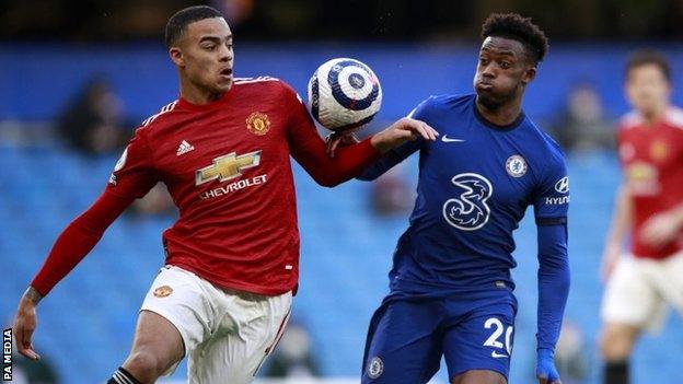 Mason Greenwood and Callum Hudson-Odoi challenge for the ball