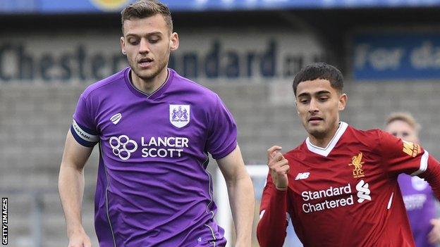 Aden Baldwin (left) in action for Bristol City Under-23s