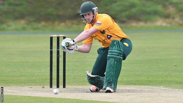 Ross Ewing in action for North Down against YMCA