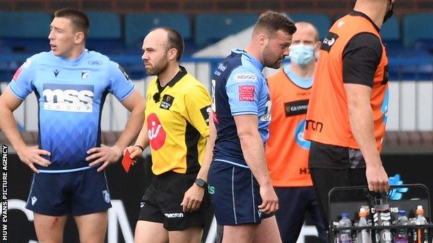 Cardiff Blues centre Owen Lane is shown the red card by Scottish referee Mike Adamson