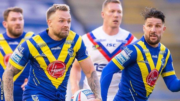 Warrington Wolves stand-off Blake Austin (left) has now scored three hat-tricks in his career