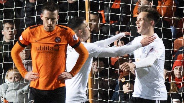 Lawrence Shankland (right) celebrates scoring for Ayr United against Dundee United