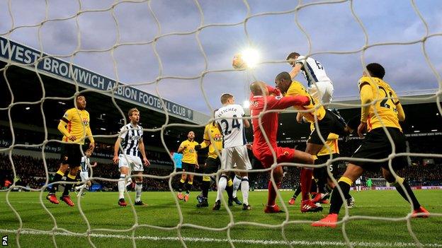 Jonny Evans heads in West Brom's opener against Watford