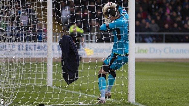 Dundee goalkeeper David Mitchell on the goal line