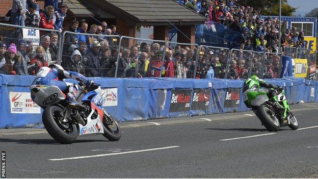 Derek McGee leads the second Supersport race from William Dunlop, who went on to win