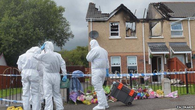 Forensic investigators examine the murder scene in Hazel View, Lagmore