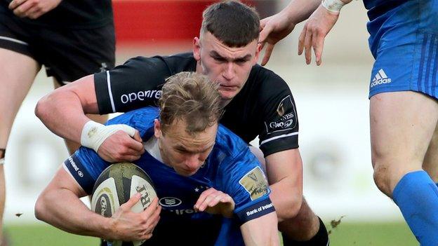 Ulster A's Ben Moxham tackles Leinster A's Niall Comerford