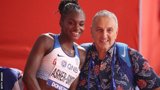 Asher-Smith celebrates victory with her coach John Blackie