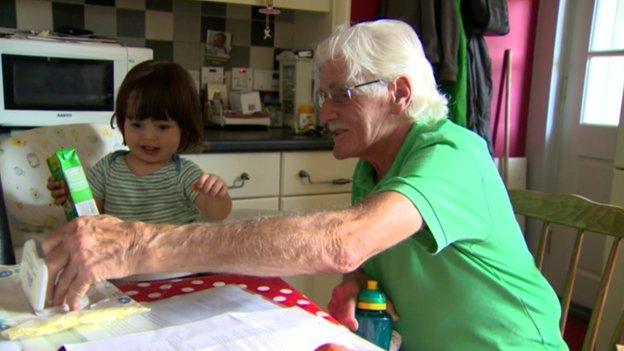 John O'Hagan with grandchild