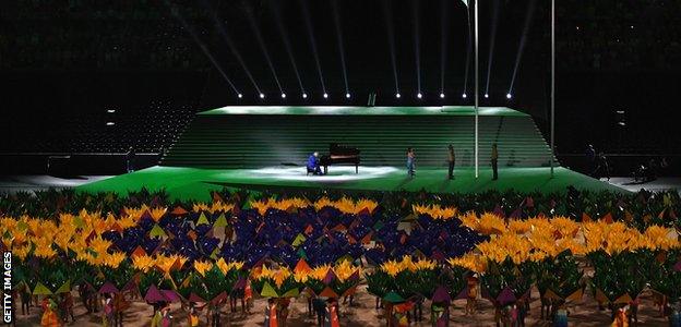 The Brazil flag displayed by performers at the opening ceremony.