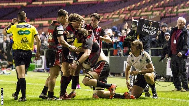 Edinburgh celebrate a late score from Alex Toolis at Murrayfield