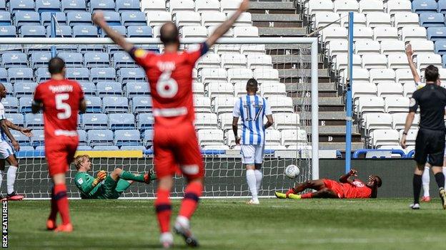 Jamal Lowe scores for Wigan