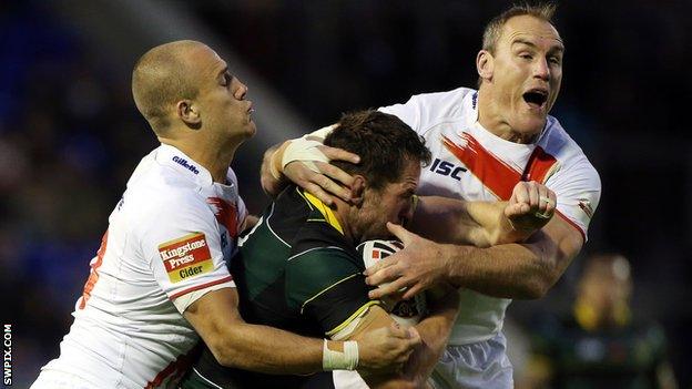 Gareth Ellis and Lee Mossop tackle Pat Richards