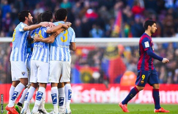 Malaga celebrate La Liga win at Barcelona