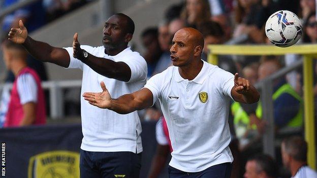 Dino Maamria (right) working as Jimmy Floyd Hasselbaink's assistant at Burton