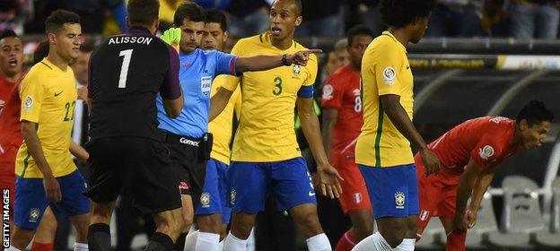 Brazil players complain at Peru winner