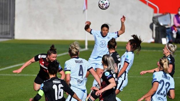 Chelsea draw level as clearance hits the head of Melanie Leupolz (third from right)