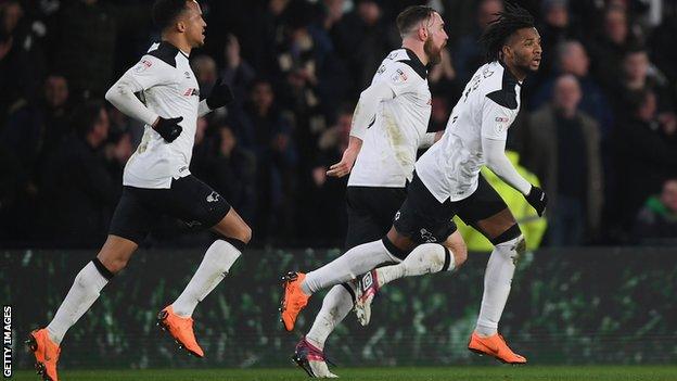 Kasey Palmer celebrates an injury-time equaliser
