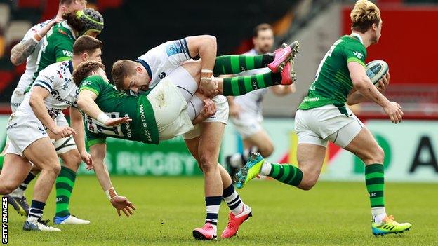 Bristol centre Sam Bedlow tip-tackles London Irish centre Theo Brophy Clews