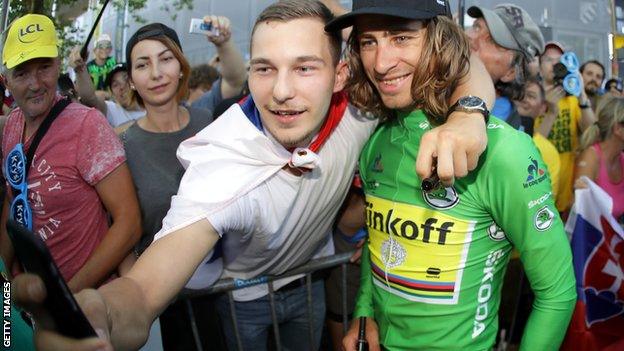 Peter Sagan stops for a selfie with a fan at the 2016 Tour de France