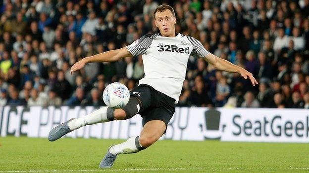 Krystian Bielik in action for Derby