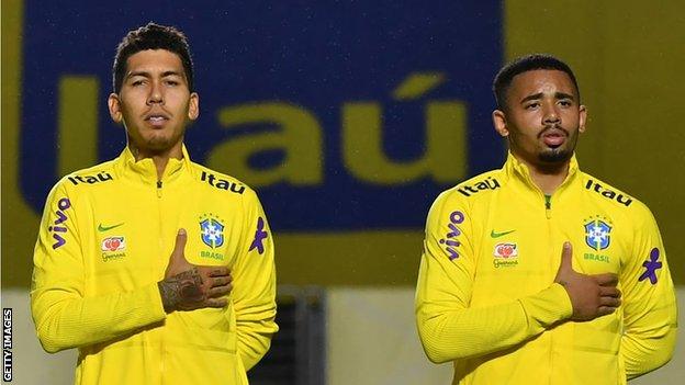 Roberto Firmino of Liverpool and Gabriel Jesus of Manchester City