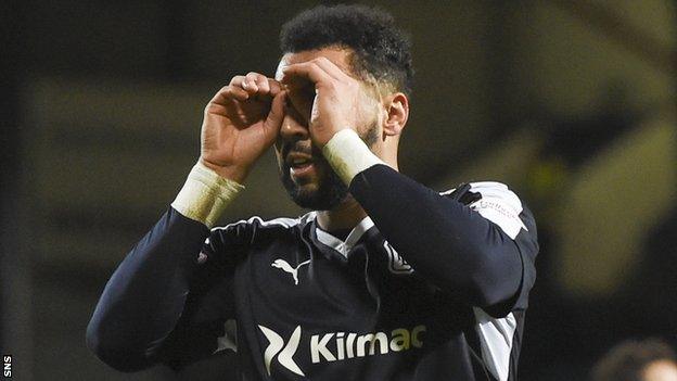 Dundee's Kane Hemmings celebrates