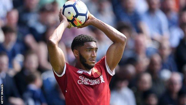 Liverpool's Joe Gomez takes a throw-in