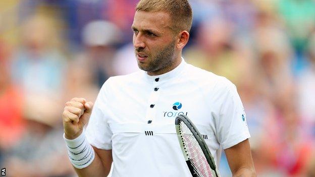 Dan Evans celebrates during his win over Radu Albot