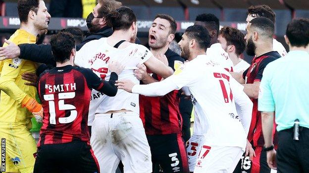 Bournemouth and Watford players clash