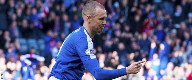 Rangers striker Kenny Miller celebrates