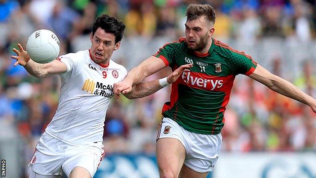 Mattie Donnelly in action against Aidan O'Shea in Saturday's first semi-final at Croke Park