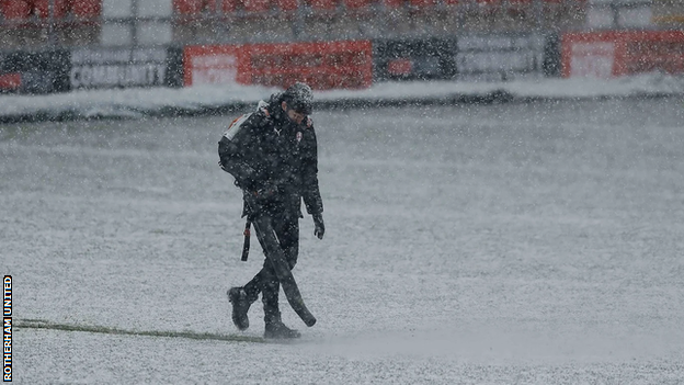 Rotherham staff member with snow blower