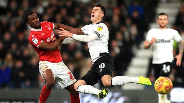 Tendayi Darikwa challenges Tom Lawrence