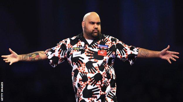 Kyle Anderson celebrates in his First Round match against Xiaochen Zong of China at the 2020 William Hill World Darts Championship