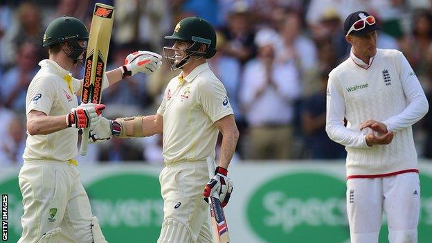 Steven Smith and Chris Rogers of Australia celebrate