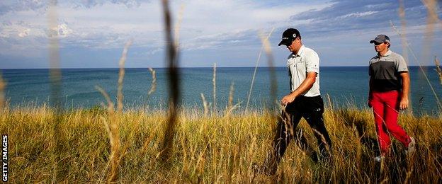 Zach Johnson of the United States and Rory McIlroy of Northern Ireland