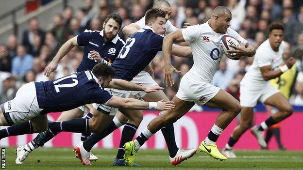 Centre Jonathan Joseph scores a try against England