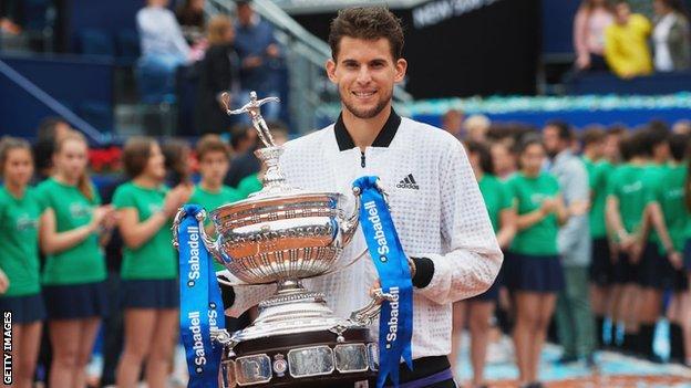 Austria's Dominic Thiem holds up the 2019 Barcelona Open trophy