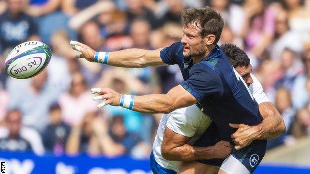 Scotland's Peter Horne is tackled by France's Charles Ollivon