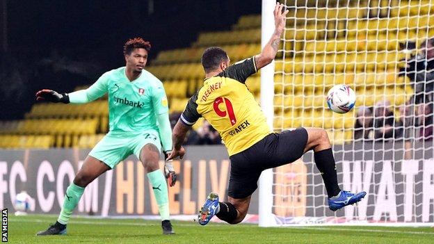 Troy Deeney scores Watford's second goal against Rotherham