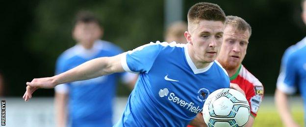 Ryan Curran in action for Ballinamallard against his new club Cliftonville last season