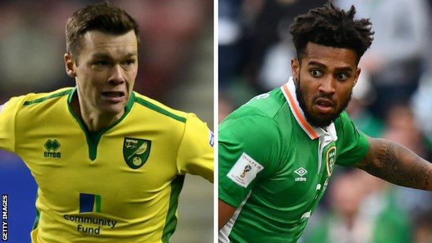 Jonny Howson and Cyrus Christie