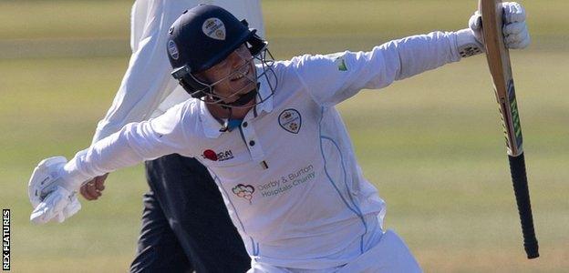 Derbyshire batsman Brook Guest celebrates his century