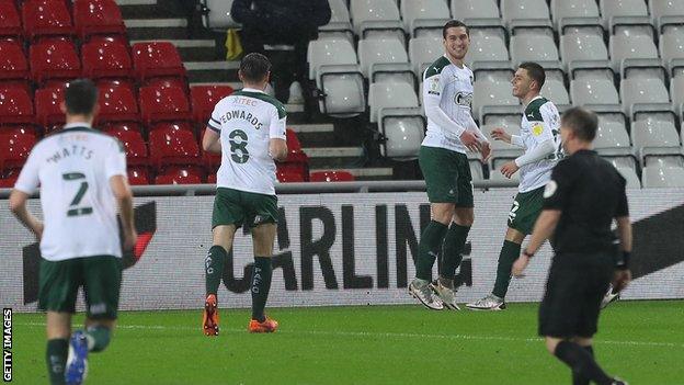 Plymouth players celebrate a goal at Sunderland