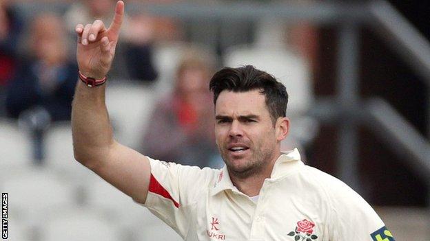 James Anderson celebrates taking a wicket for Lancashire